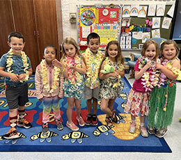 Students in Hawaiian outfits