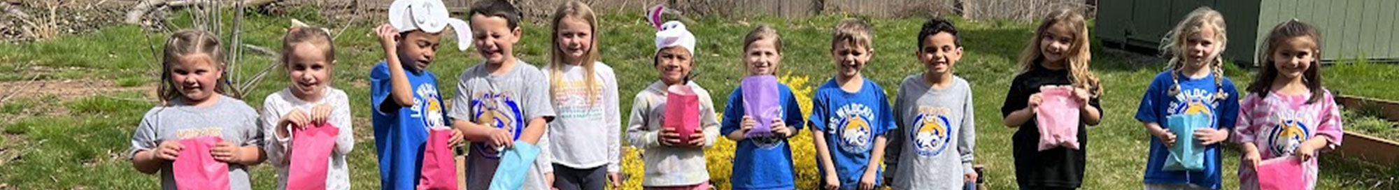 Students holding easter bags